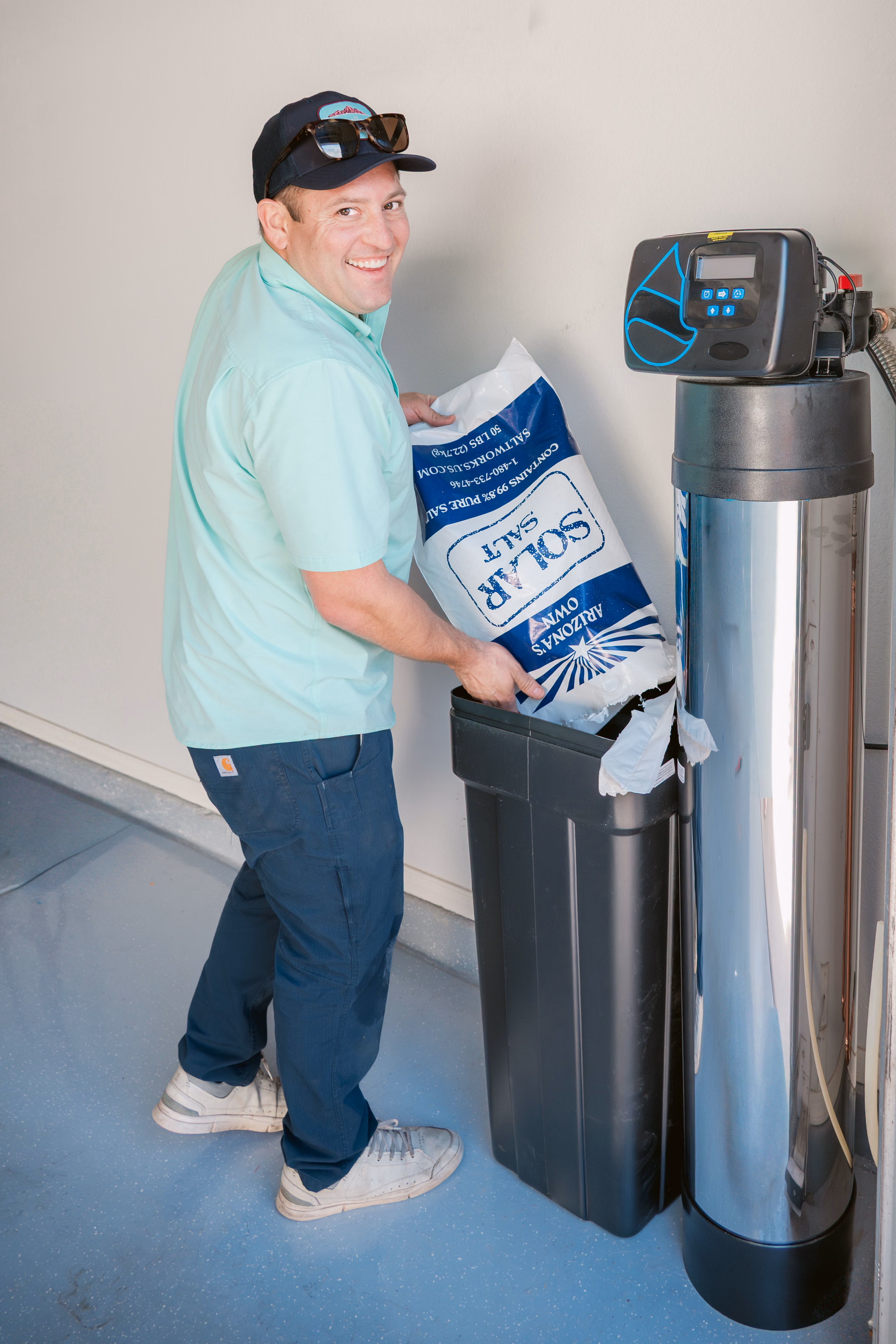 Gabe Sandersius servicing a home water-treatment system